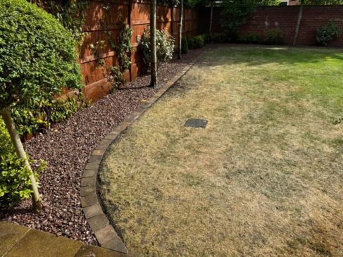 pink gravel flower bed brick edging preston 04