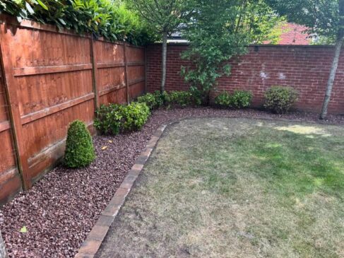 pink gravel flower bed brick edging preston 05