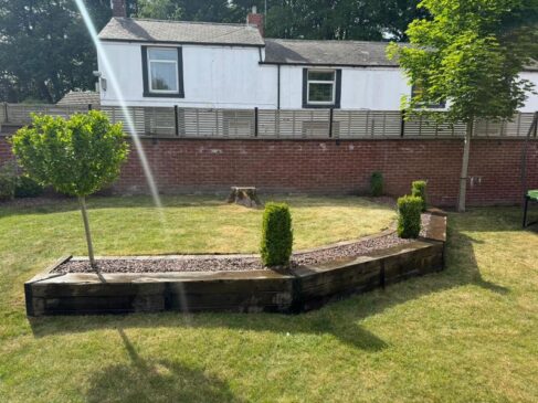 pink gravel flower bed brick edging preston 06