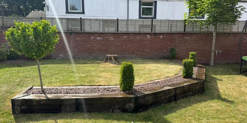 pink gravel flower bed brick edging preston 06