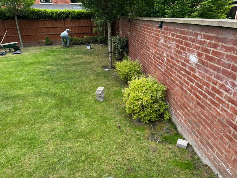pink gravel flower bed brick edging preston 17