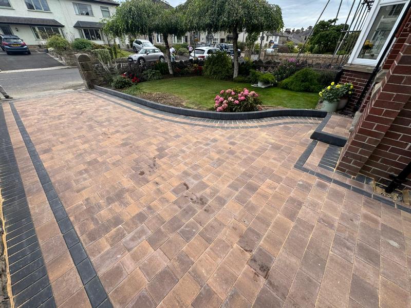 block paved driveway with double charcoal border in bury 12